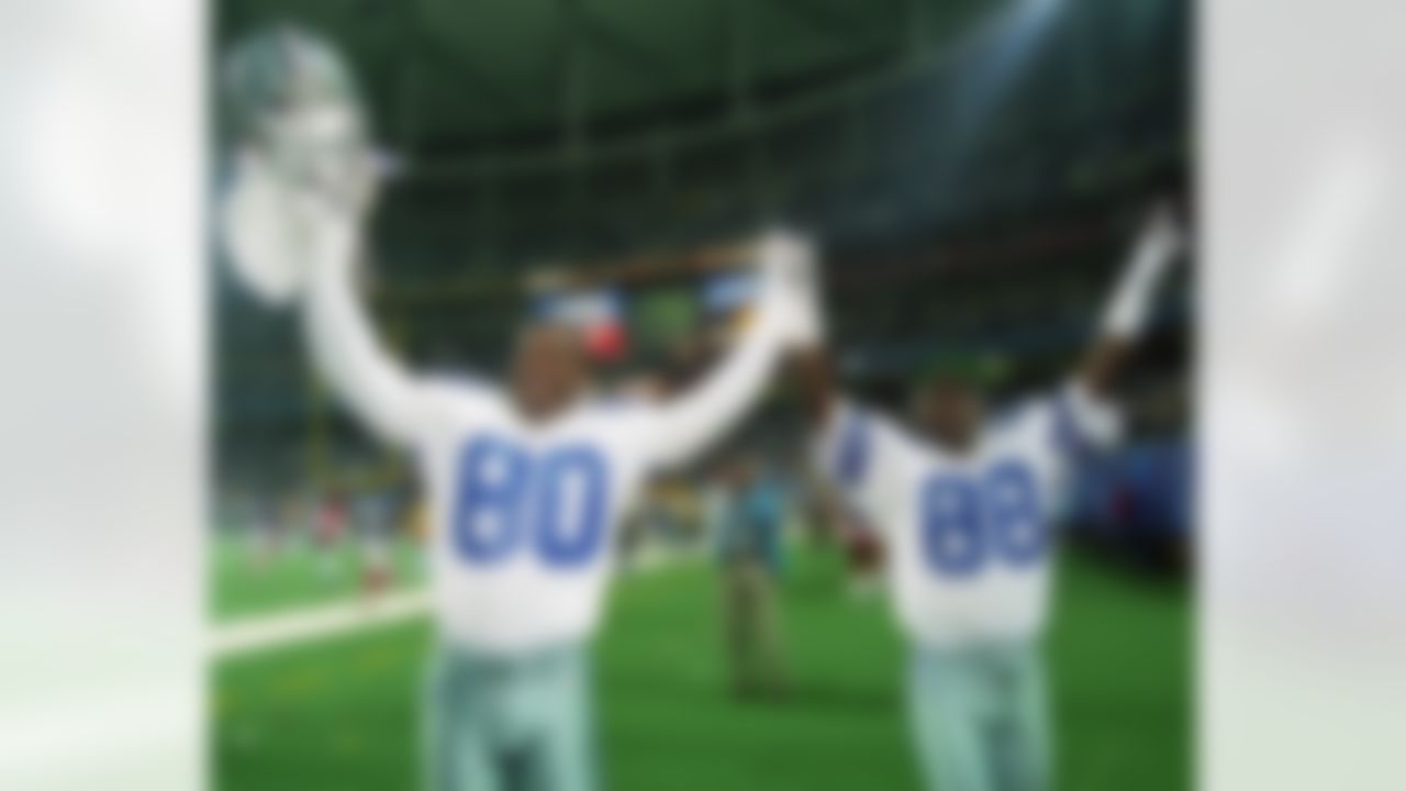 Dallas Cowboys wide receiver Alvin Harper (80) and wide receiver Michael Irvin (88) celebrate after the NFL Super Bowl XXVIII game against the Buffalo Bills on January 30, 1994, in Atlanta, Ga. The Cowboys defeated the Bills 30-13. (National Football League)