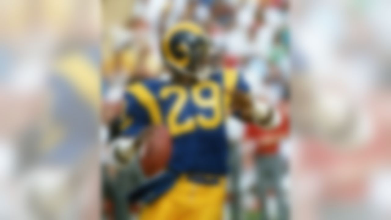 Los Angeles Rams Hall of Fame running back Eric Dickerson (29) sets up to throw a touchdown pass to tight end David Hill during a 14-7 victory over the Atlanta Falcons on October 26, 1986, at Anaheim Stadium in Anaheim, California. (National Football League)