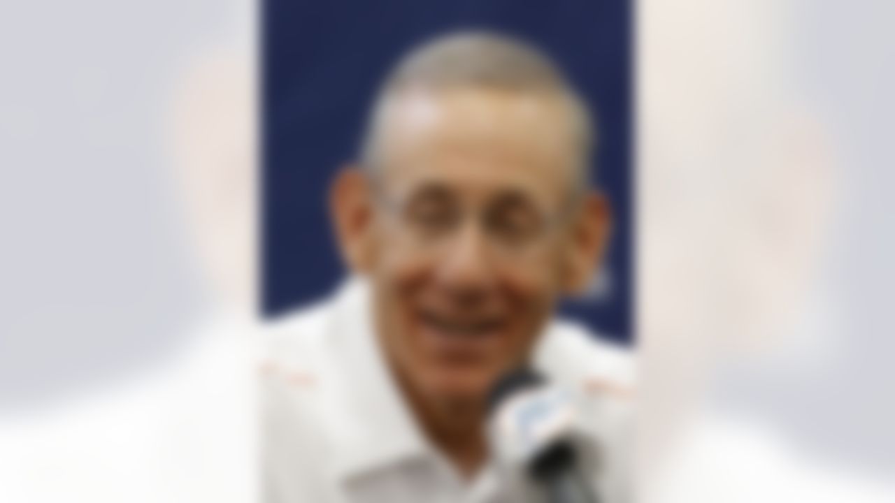 Miami Dolphins' owner Stephen Ross smiles as he talks to reporters after practice at NFL football training camp in Davie, Fla., Friday, July 27, 2012. (AP Photo/Alan Diaz)