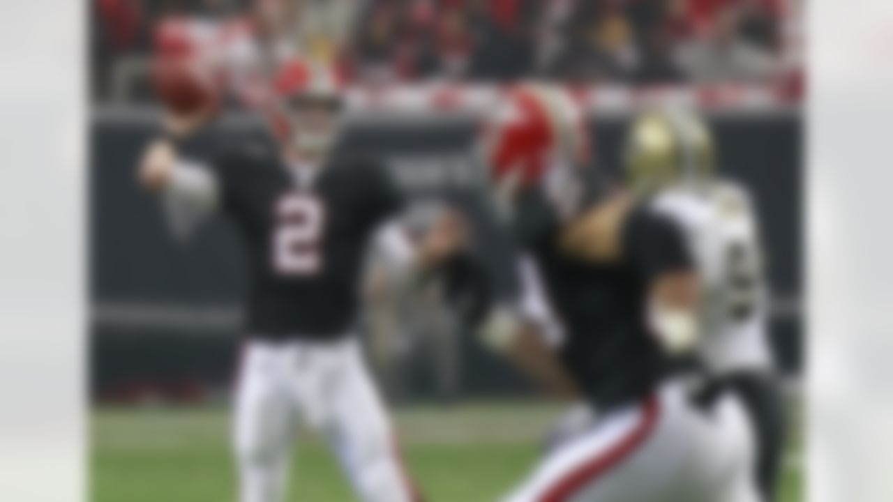 Atlanta Falcons quarterback Matt Ryan (2) works against the New Orleans Saints during the first half of an NFL football game on Sunday, Nov. 13, 2011, in Atlanta. (AP Photo/John Bazemore)