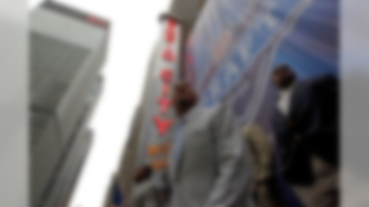 NFL draft prospect Joe Haden (center) and other prospects pose on top of the Radio City Music Hall marquis in New York City, NY on Apr. 21, 2010. (AP Photo/Ben Liebenberg).