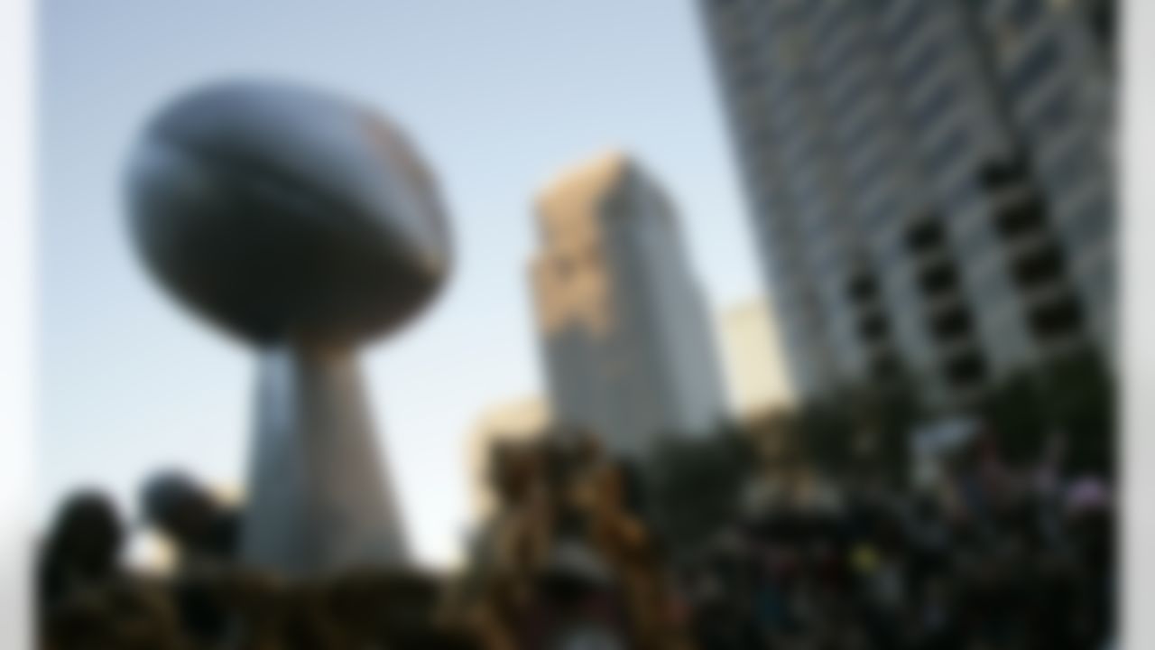 A giant version of the Vince Lombardi Trophy stands on one of the floats that carried members of the New Orleans Saints NFL football team during a parade through the central business district of New Orleans, Tuesday, Feb. 9, 2010. The Saints and fans were celebrating the Saints' 31-17 victory over the Indianapolis Colts in Super Bowl XLIV. (AP Photo/Patrick Semansky)