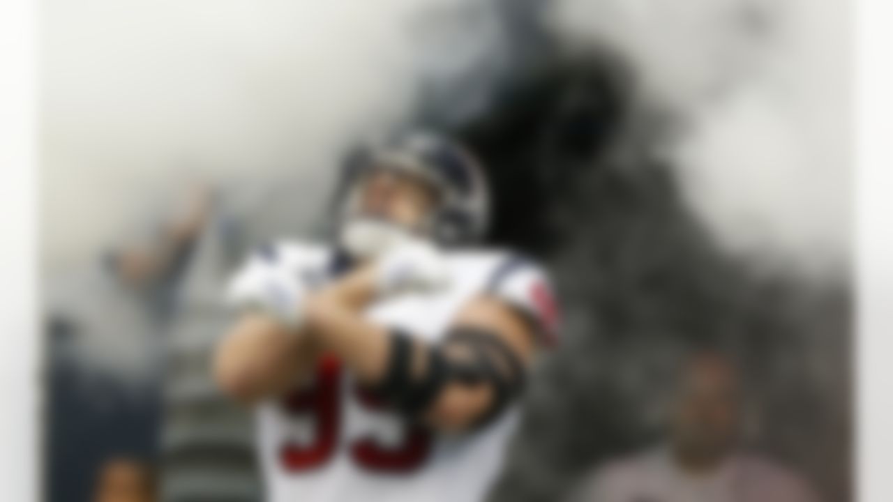 Houston Texans defensive end J.J. Watt (99) is introduced to the crowd during player introductions prior to an NFL football game against the Tennessee Titans at Reliant Stadium on September 15, 2013 in Houston, Texas. Houston won 30-24. (Aaron M. Sprecher/NFL)