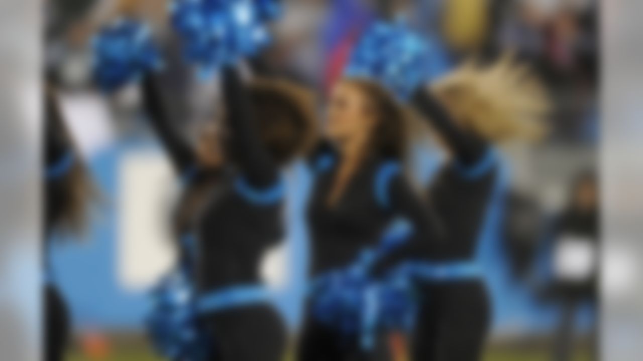 Carolina Panthers cheerleaders perform in the first half of an NFL football game against the Indianapolis Colts in Charlotte, N.C., Monday, Nov. 2, 2015. (AP Photo/Mike McCarn)