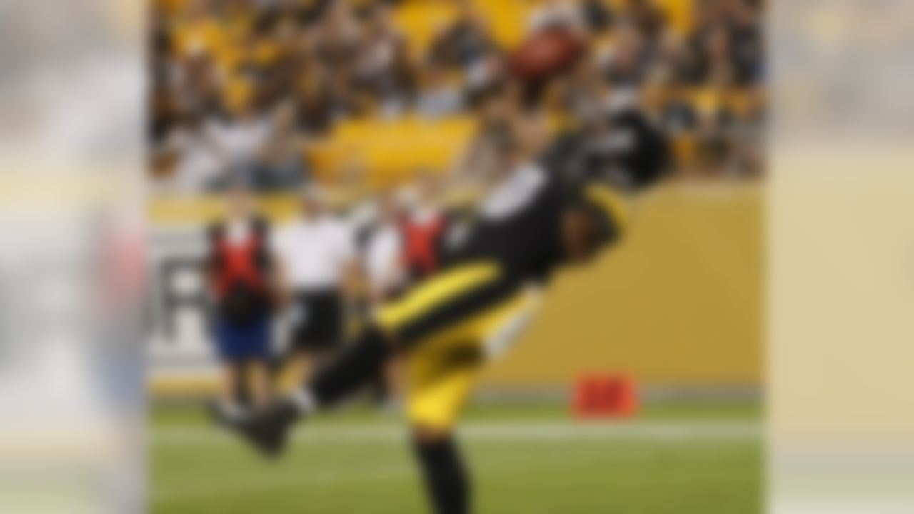 Pittsburgh Steelers wide receiver Quadree Henderson hauls in a pass from quarterback Mason Rudolph for a touchdown during the second half of a pre season NFL football game against the Carolina Panthers in Pittsburgh, Thursday, Aug. 30, 2018.