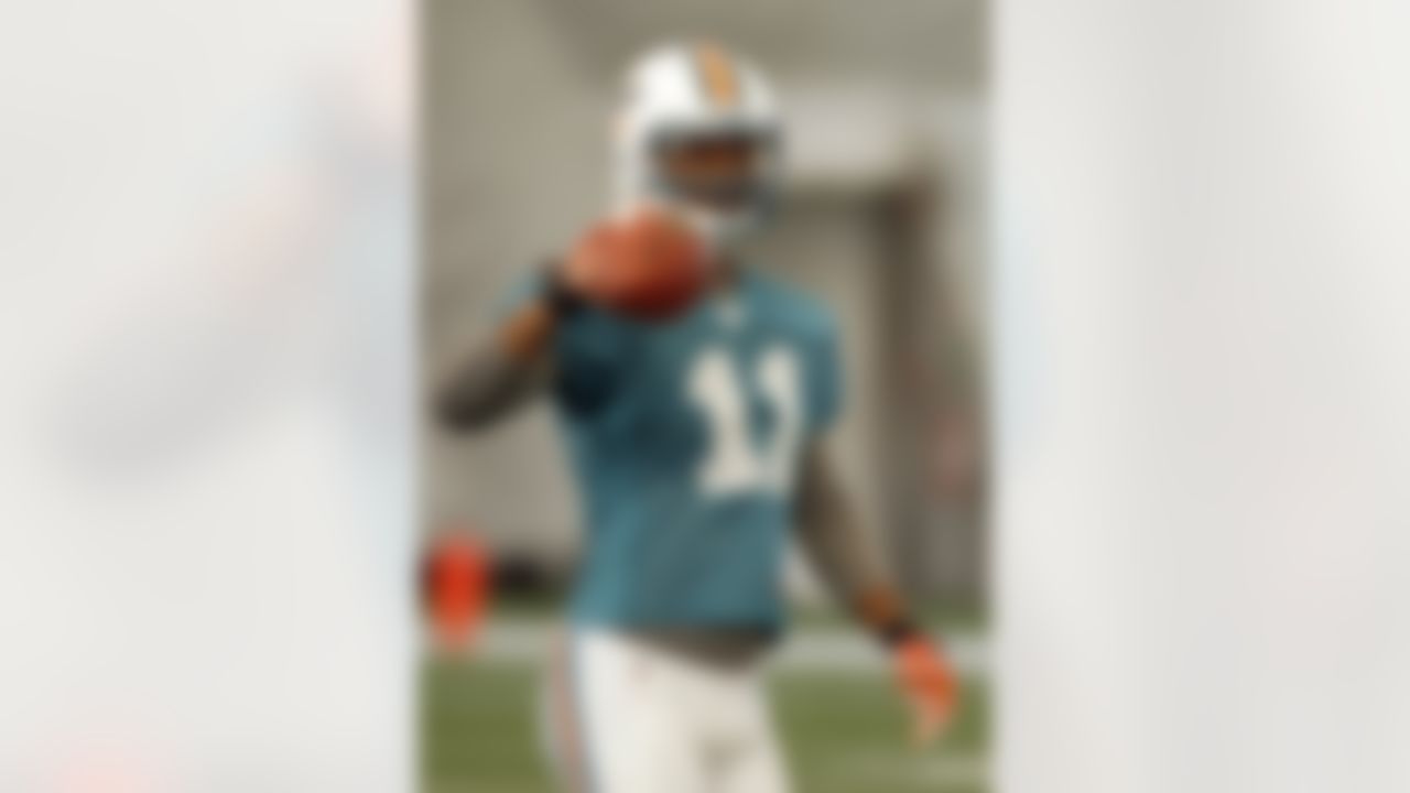 Miami Dolphins' Julius Pruitt practices during NFL football training camp in Davie, Fla., Monday, Aug. 13, 2012. (AP Photo/Alan Diaz)
