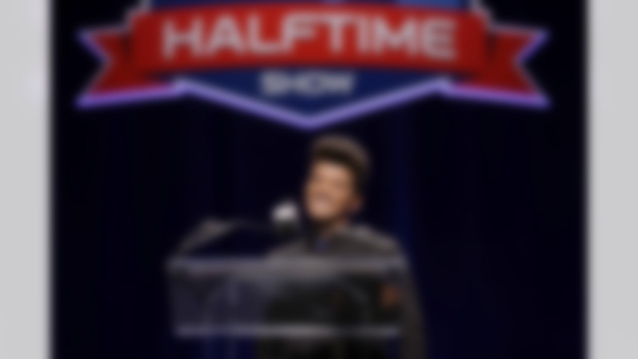 Bruno Mars who will headline the half-time show at the NFL Super Bowl XLVIII football game speaks during a press conference Thursday, Jan. 30, 2014, in New York. (AP Photo)