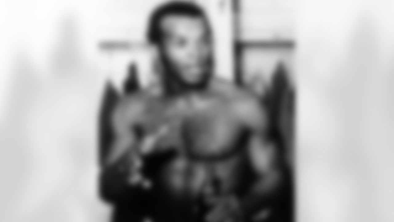 Herb Adderley, veteran defensive back, who saved the Green Bay Packers victory over the San Francisco 49ers in Green Bay, Wisconsin on Sunday, Oct. 1, 1969, with a last-minute goal line pass interception, tells newsmen how it really was. Adderley was named today the Associated Press Defensive Player of the Week in the National Football League. (AP Photo)