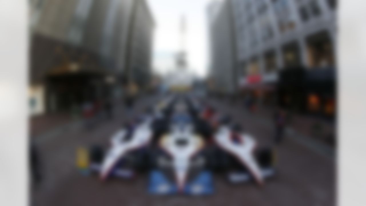 Jan 29, 2012; Indianapolis, IN, USA; A general view of Indy racing cars in NFL team logo paint schemes in preparation for Super Bowl XLVI as seen south of Monument Circle in downtown Indianapolis. Mandatory Credit: Brian Spurlock-US PRESSWIRE