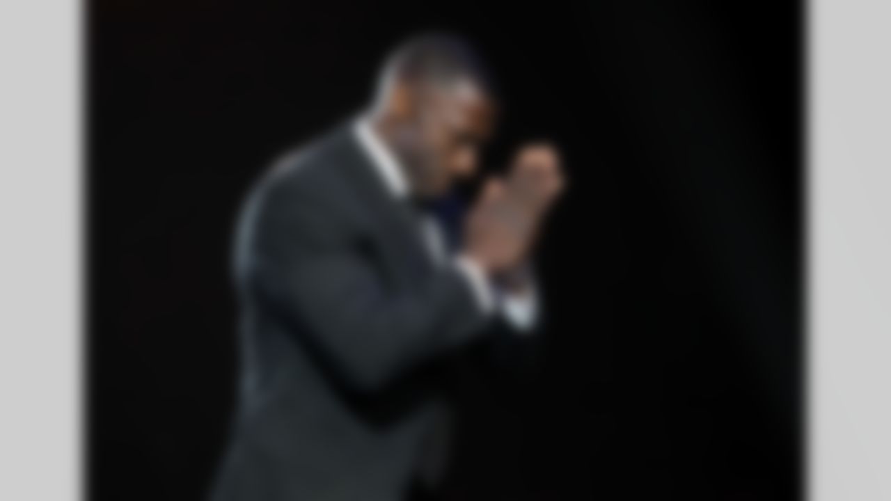 Shannon Sharpe says thank you to the audience during the Pro Football Hall of Fame enshrinees dinner at the Civic Auditorium in Canton, Ohio on Friday Aug. 5, 2011. (AP Photo/Ben Liebenberg)