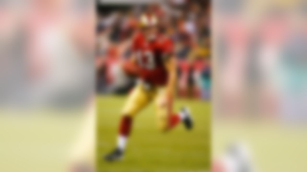 SAN FRANCISCO - DECEMBER 15: Shaun Hill #13 of the San Francisco 49ers rolls out for a touchdown run against the Cincinnati Bengals on December 15, 2007 at Monster Park in San Francisco, California. The 49ers defeated the Bengals 20-13. (Photo by Joe Robbins/Getty Images)
