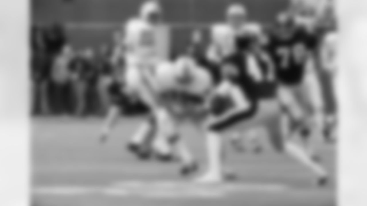 Larry Csonka, Miami Dolphins back, picks up yardage in game against the Pittsburgh Steelers in Pittsburgh, Pa., Sunday Jan. 1, 1972. Dolphins won, 21-17 and will go on to play in the Super Bowl. (Associated Press)