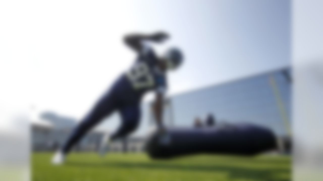 Dallas Cowboys defensive end Taco Charlton (97) runs through a drill during a minicamp practice at its NFL football training facility in Frisco, Texas, Thursday, June 15, 2017. (James D. Smith via AP)