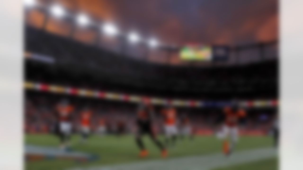 Cleveland Browns wide receiver Jarvis Landry (80) scores a touchdown in front of Denver Broncos linebacker A.J. Johnson (45), defensive back Duke Dawson (20) and linebacker Justin Hollins (52) during the second half of NFL football game, Sunday, Nov. 3, 2019, in Denver.