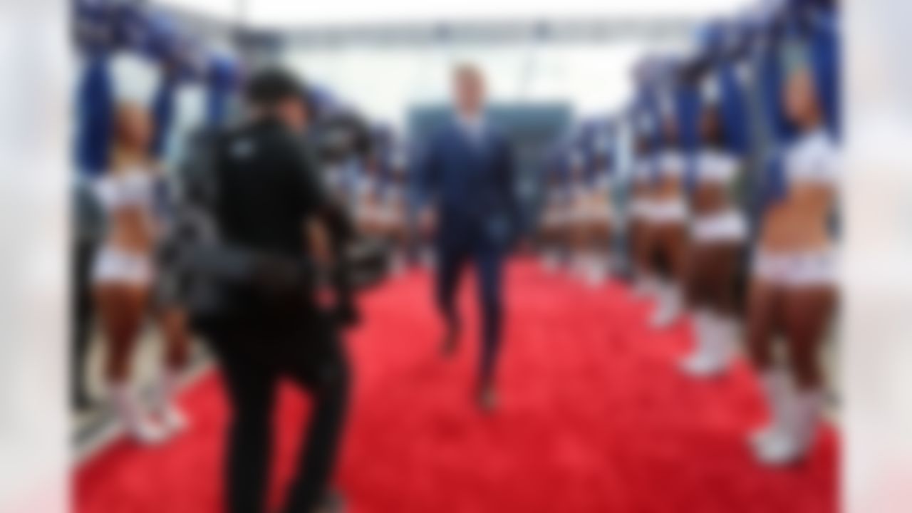UCLA quarterback Josh Rosen walks down the red carpet.