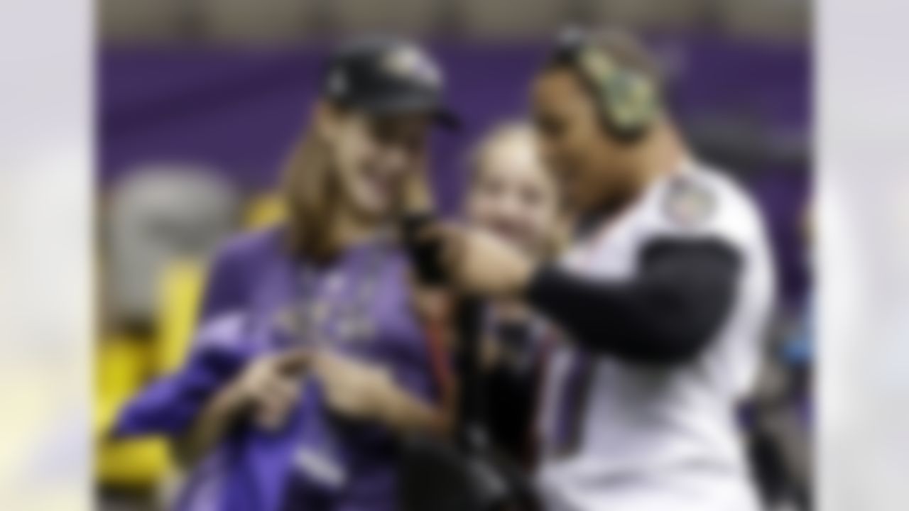 Baltimore Ravens running back Ray Rice, right, chats with Margaret Rosburg, left, daughter of assistant head coach and special teams coordinator Jerry Rosburg, and Alison Harbaugh, daughter of head coach John Harbaugh, before an NFL Super Bowl XLVII walkthrough on Saturday, Feb. 2, 2013, in the Mercedes-Benz Superdome in New Orleans. The Ravens face the San Francisco 49ers in Super Bowl XLVII on Sunday. (AP Photo/Patrick Semansky)