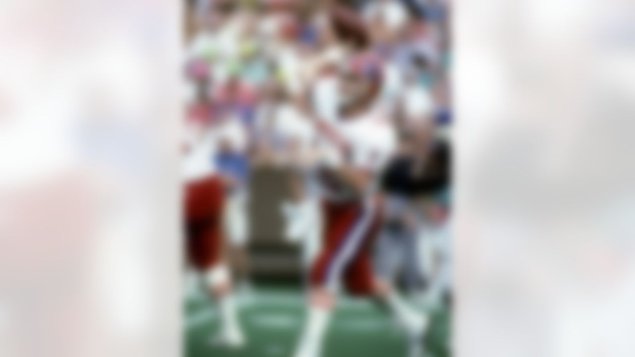AFC Hall of Fame quarterback Jim Kelly of the Buffalo Bills throws a pass during the AFC's 23-21 victory over the NFC in the 1991 NFL Pro Bowl played on February 3, 1991 at Aloha Stadium in Honolulu, Hawaii. (National Football League)