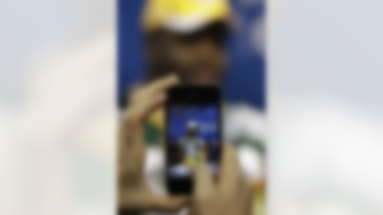 Green Bay Packers' B.J. Raji is seen on the camera of an iPhone during media day for NFL football Super Bowl XLV Tuesday, Feb. 1, 2011, in Arlington, Texas. (AP Photo/David J. Phillip)