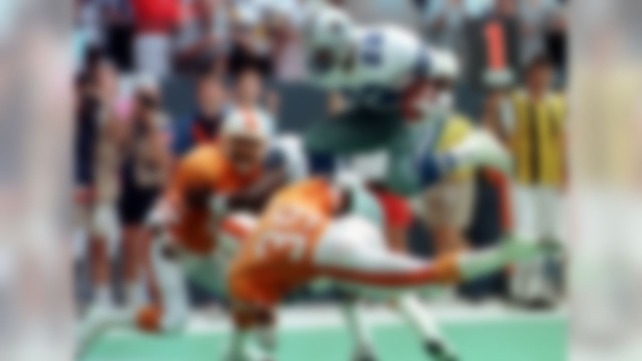 In his 15 seasons in the NFL, Smith rushed for 1,000 or more yards in 11 of those seasons. He led the league four times, all within a five-year stretch during the Dallas Cowboys' reign of terror during the 1990s. Smith was the latest in a long lineage of the NFL's greatest backs to conquer this prestigious record, before Smith, Walter Payton held the mark. Before Payton, Jim Brown was the record-holder. Before Brown, it was Joe Perry. Before Perry, it was Steve Van Buren. Before Van Buren, it was Clarke Hinkle. And before Hinkle, it was Cliff Battles.