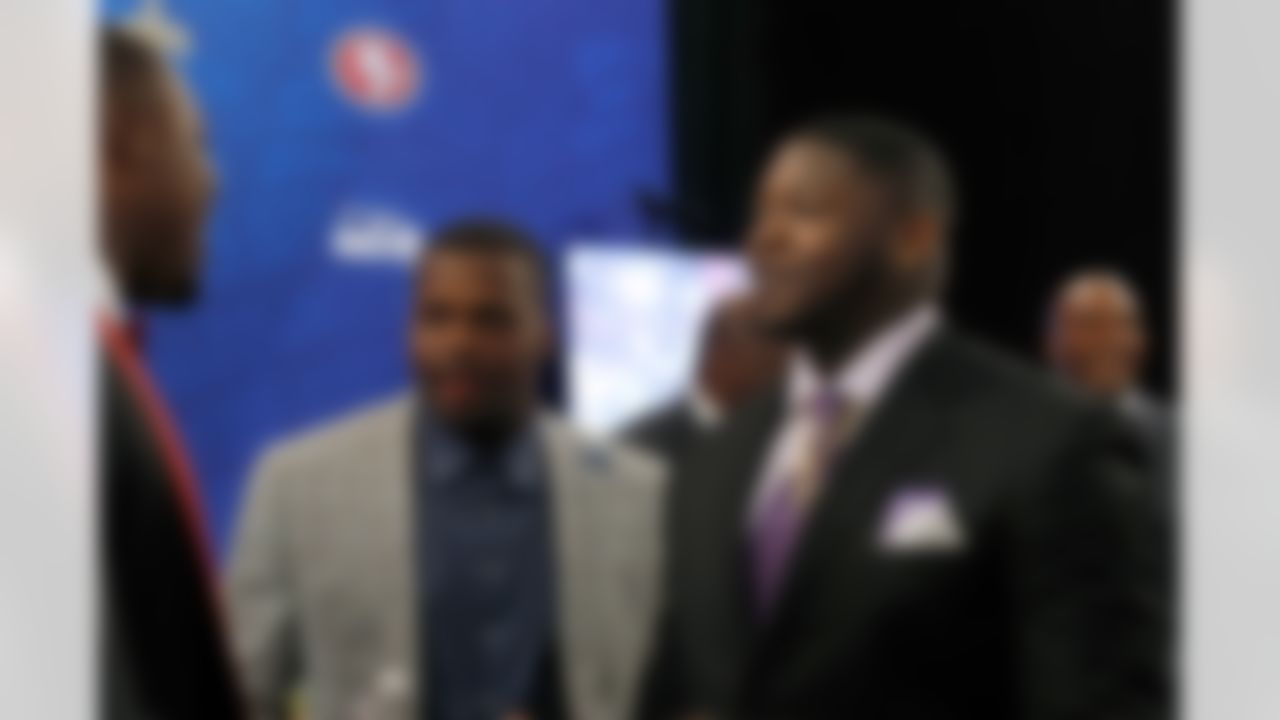 Alabama linebacker Reggie Ragland and defensive tackle Jarran Reed speak backstage during the 2016 NFL Draft at the Auditorium Theatre on Friday, April 29, 2016 in Chicago. (Ben Liebenberg/NFL)