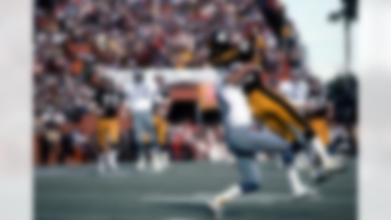 Pittsburgh Steelers Hall of Fame wide receiver John Stallworth (82) is tackled as he catches a pass during Super Bowl X Jan. 18, 1976, at the Orange Bowl in Miami. (Tony Tomsic via AP)