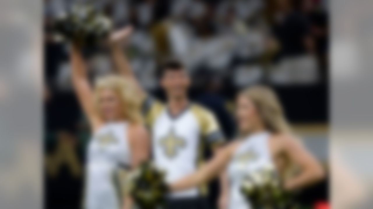 New Orleans Saints cheerleader Jesse Hernandez, a member of the Saintsations, dances in the first half of an NFL football game against the Tampa Bay Buccaneers in New Orleans, Sunday, Sept. 9, 2018.