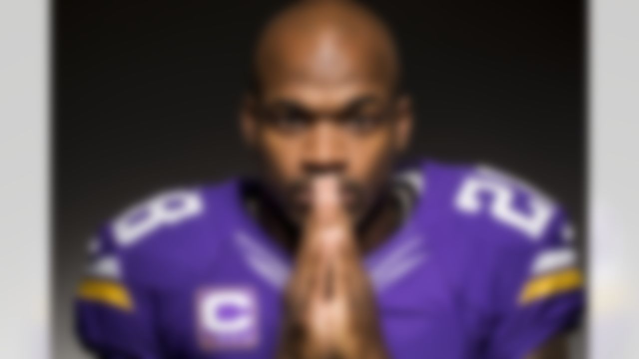 Minnesota Vikings running back Adrian Peterson poses with his hands in prayer for a portrait at the Vikings' Headquarters in Eden Prairie, MN. (Todd Rosenberg via AP)