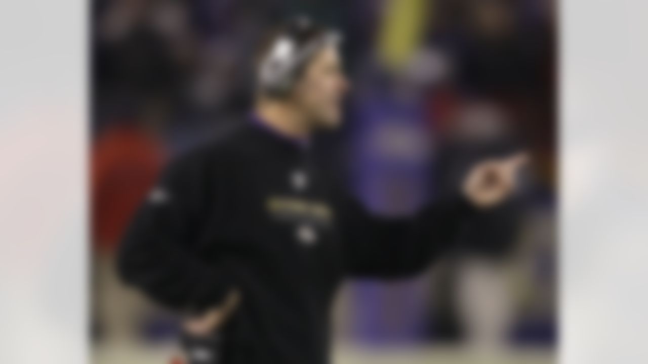 Baltimore Ravens coach John Harbaugh argues a call with an official during the second half of an NFL football game against the Pittsburgh Steelers on Sunday, Dec. 14, 2008, in Baltimore. The Steelers won 13-9. (AP Photo/Rob Carr)
