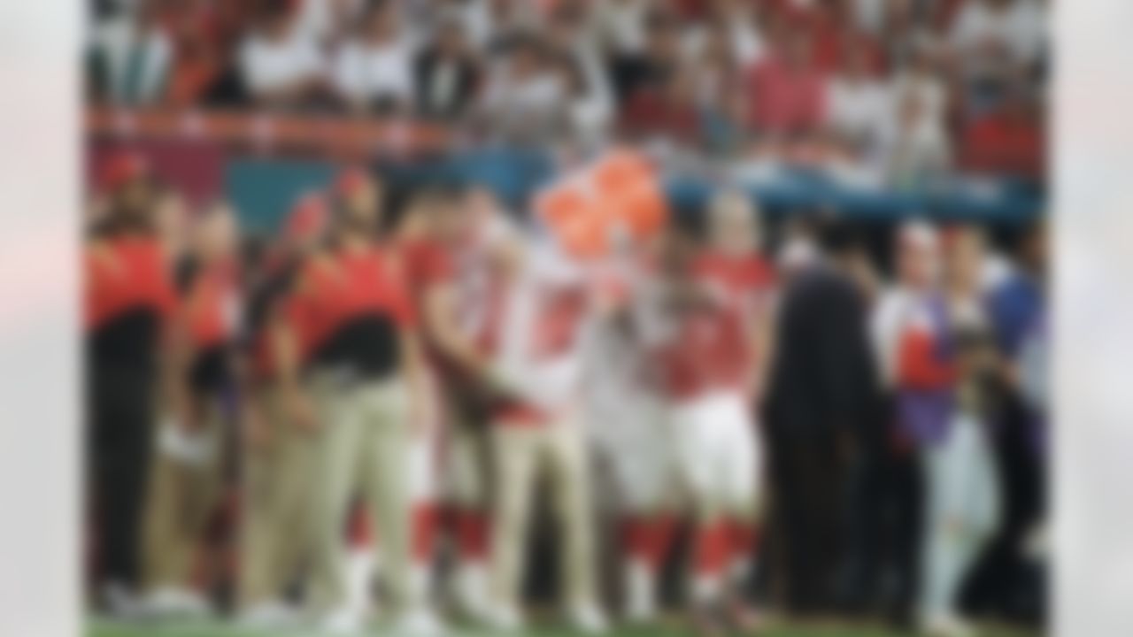 San Francisco 49ers head coach George Seifert (center) is doused by team members near the end of the fourth quarter of Super Bowl XXIX, on Sunday, Jan. 29, 1995 at Joe Robbie Stadium in Miami. The 49ers defeated the San Diego Chargers, 49-26. (AP Photo/Lynne Sladky)