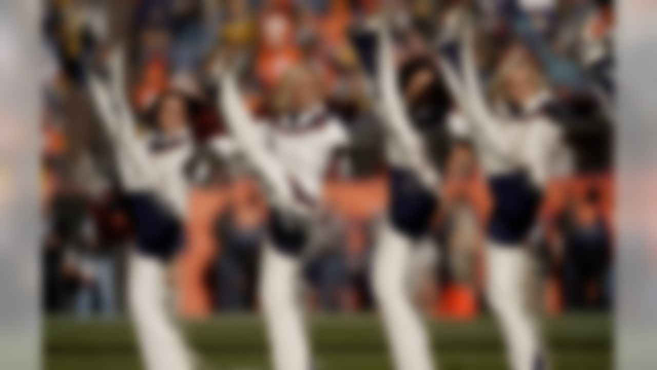The Denver Broncos cheerleaders take the field prior to an NFL football game against the Pittsburgh Steelers, Sunday, Nov. 25, 2018, in Denver.