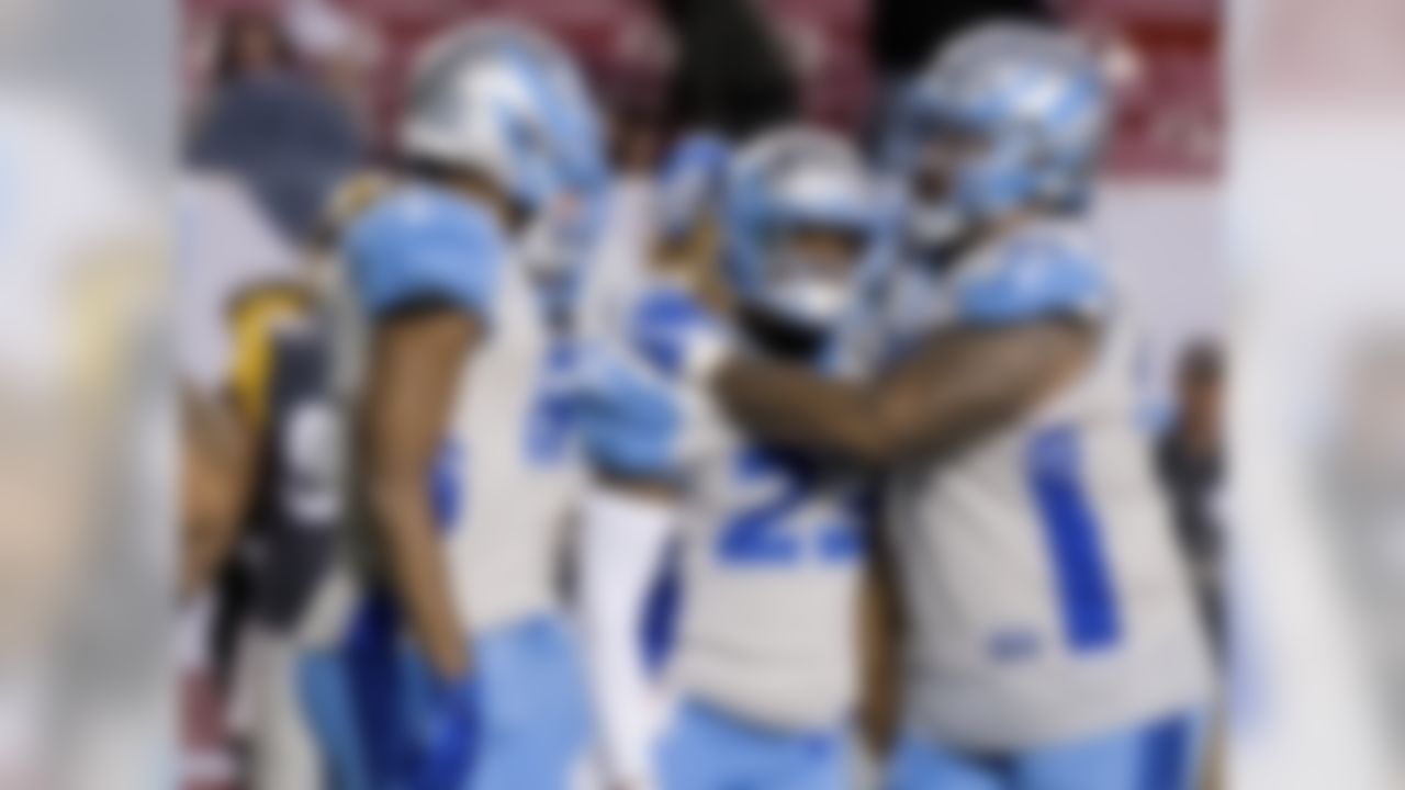 Salt Lake Stallions defensive back Steve Williams (23) is congratulated by teammates after his game winning interception in the second half during an Alliance of American Football game, Saturday March 30, 2019 in Salt Lake City.