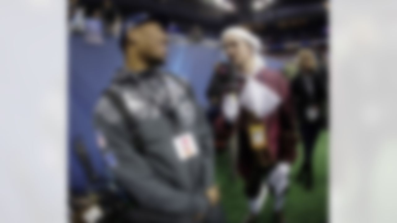 Phillip Hajszan interviews Seattle Seahawks' Bruce Irvin during media day for the NFL Super Bowl XLVIII football game Tuesday, Jan. 28, 2014, in Newark, N.J. (AP Photo/Charlie Riedel)