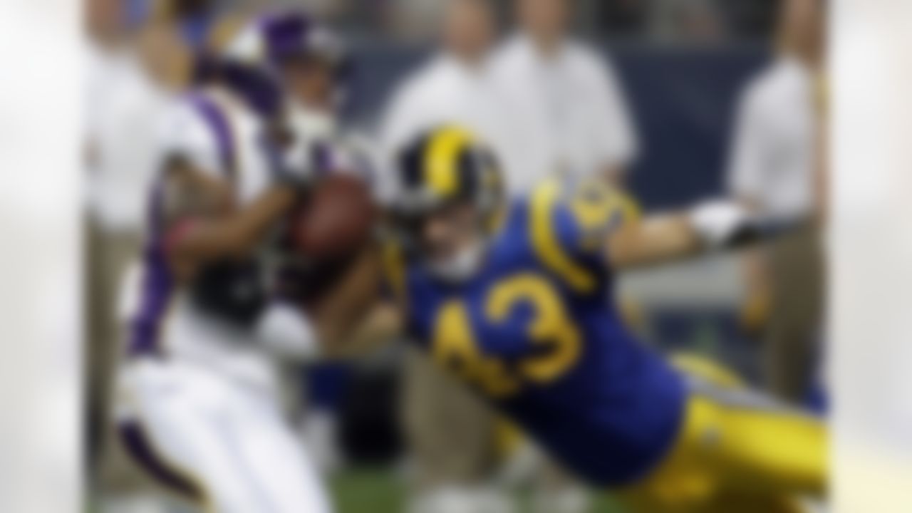 St. Louis Rams safety Craig Dahl, right, breaks up a pass intended for Minnesota Vikings wide receiver Percy Harvin during the first quarter of an NFL football game Sunday, Oct. 11, 2009, in St. Louis. (AP Photo/Michael Conroy)