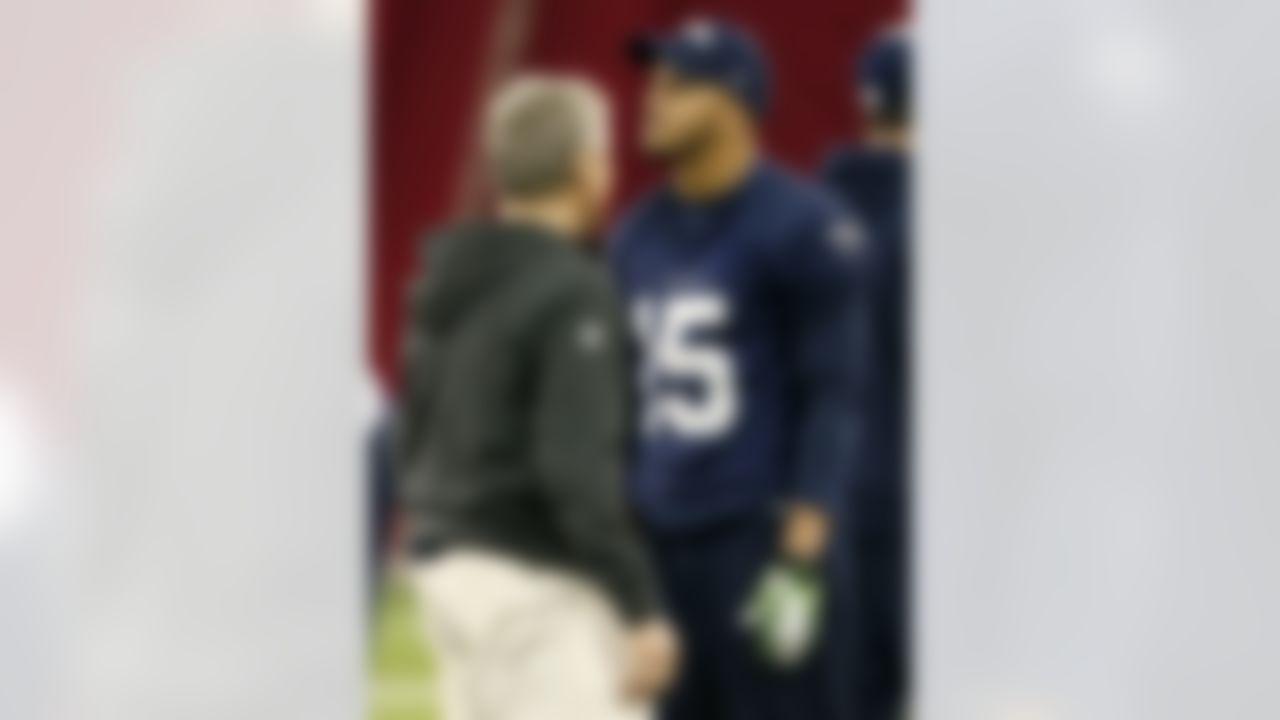 Seattle Seahawks head coach Pete Carroll talks with Jermaine Kearse (15) during a team practice for NFL Super Bowl XLIX football game, Friday, Jan. 30, 2015, in Tempe, Ariz. The Seahawks play the New England Patriots in Super Bowl XLIX on Sunday, Feb. 1, 2015. (AP Photo/Matt York)