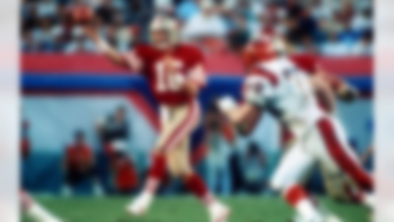 San Francisco 49ers Hall of Fame quarterback Joe Montana (16) throws a pass under pressure from the Cincinnati Bengals defense during Super Bowl XXIII on Jan. 22, 1989, at Joe Robbie Stadium in Miami. The 49ers defeated the Bengals 20�16. (Tony Tomsic via AP)