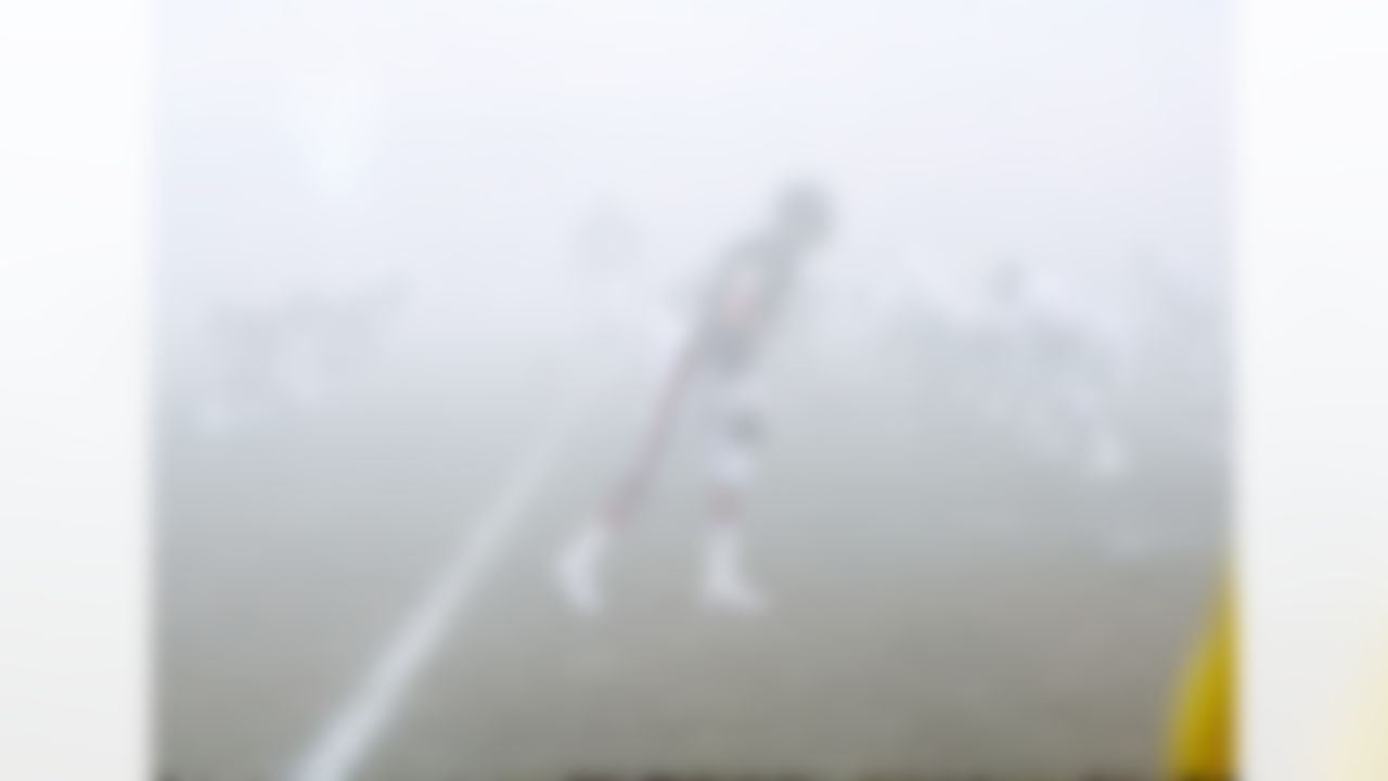 The Chicago Bears offense lines up in the fog during the NFC Divisional Playoff, a 20-12 victory over the Philadelphia Eagles on December 31, 1988, at Soldier Field in Chicago, Illinois. (National Football League)