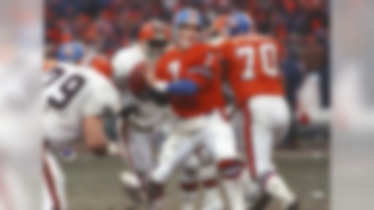 Draft: 1983
College: Stanford
NFL career: 16 seasons. Denver Broncos, 1983-1998.

There have been 31 quarterbacks (33 if you count the American Football League drafts of 1961-66, which we will in this exercise ... more on that later) taken with the No. 1 overall draft selection in the NFL draft (dating back to 1936). Four of those quarterbacks are in the Pro Football Hall of Fame (Elway, Troy Aikman, Terry Bradshaw and Joe Namath -- Namath was a No. 1 overall pick in the American Football League draft). Five years after retiring, Peyton Manning will join them in Canton. 
On top of being one of the most prolific passers in the game's history, Elway was also an accomplished scrambler; adding 3,407 yards and 33 touchdowns rushing to his 51,475 yards and 300 touchdowns passing. Elway took the Broncos to five Super Bowls, winning the final two to finish his career in spectacular style.