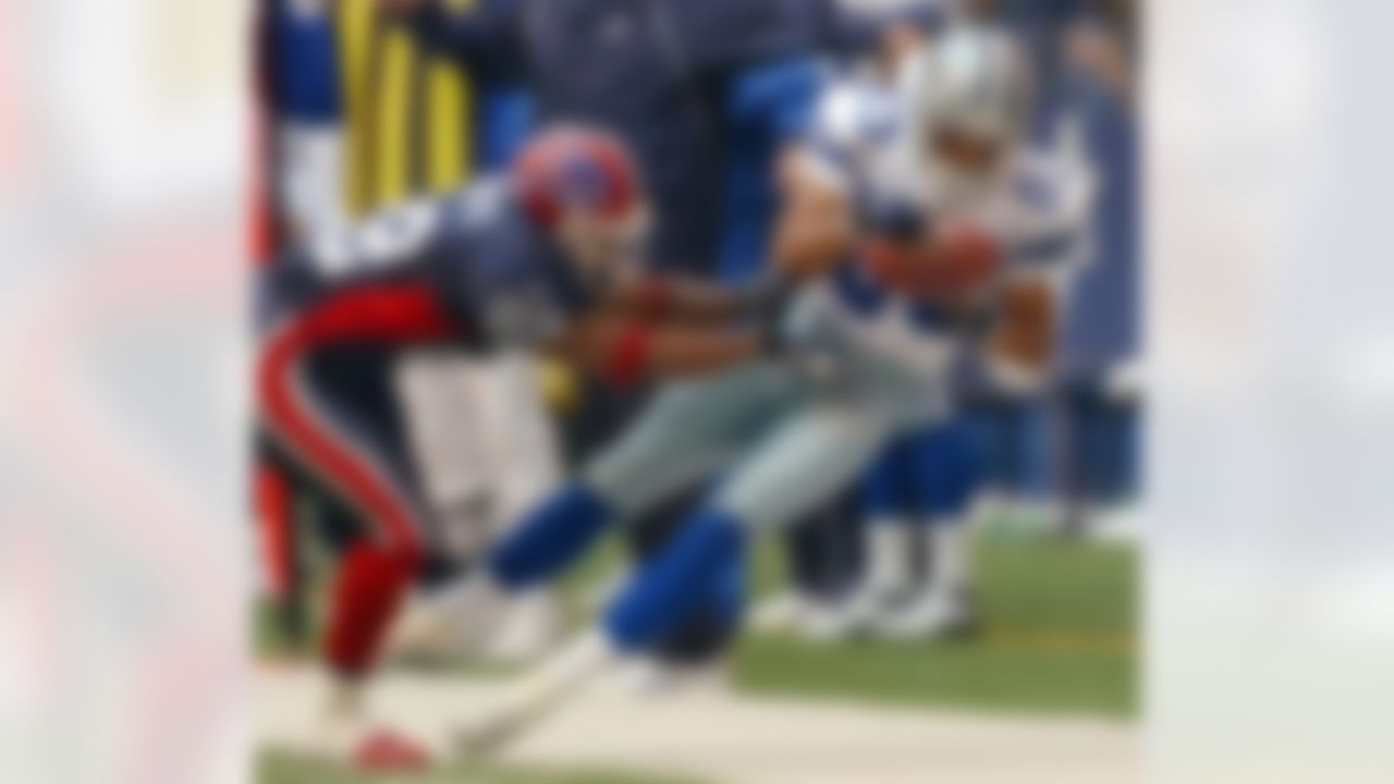 Dallas Cowboys wide receiver Terry Glenn (83) pulls in a 19-yard pass in the third quarter as Buffalo Bills cornerback Nate Clements (22) defends in Irving, Texas, Sunday, Nov. 9, 2003. (L.M. Otero/Associated Press)