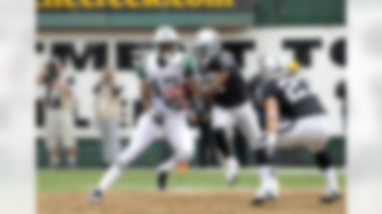 New York Jets wide receiver Plaxico Burress (17) heads downfield during an NFL game against the Oakland Raiders on Sunday, Sept. 25, 2011, in Oakland. The Raiders won the game, 34-24. (AP Photo/Greg Trott)
