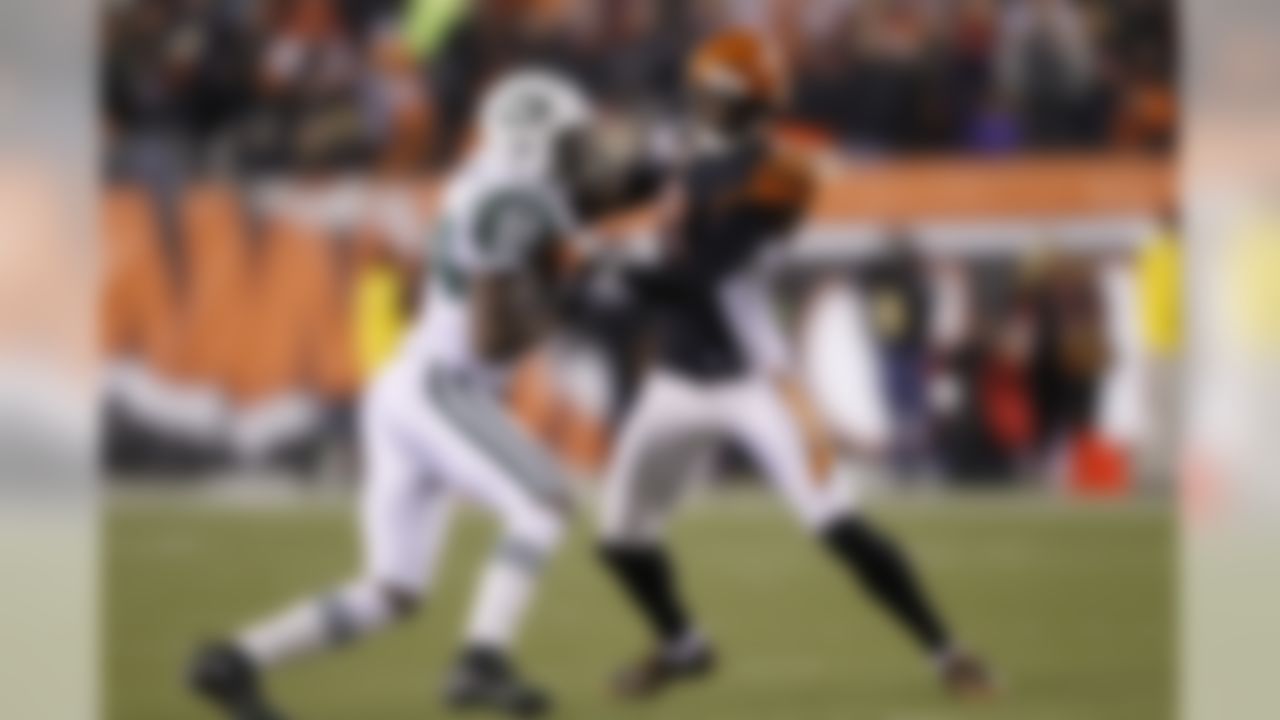 New York Jets defensive back Darrelle Revis (24) defends off the line of scrimmage against Cincinnati Bengals receiver Chad Ochocinco (85) during the AFC Wild Card Playoff game at Paul Brown Stadium in Cincinnati, Ohio on January 9, 2010. The Jets won 24-14. (Photo by Joe Robbins/NFL.com)