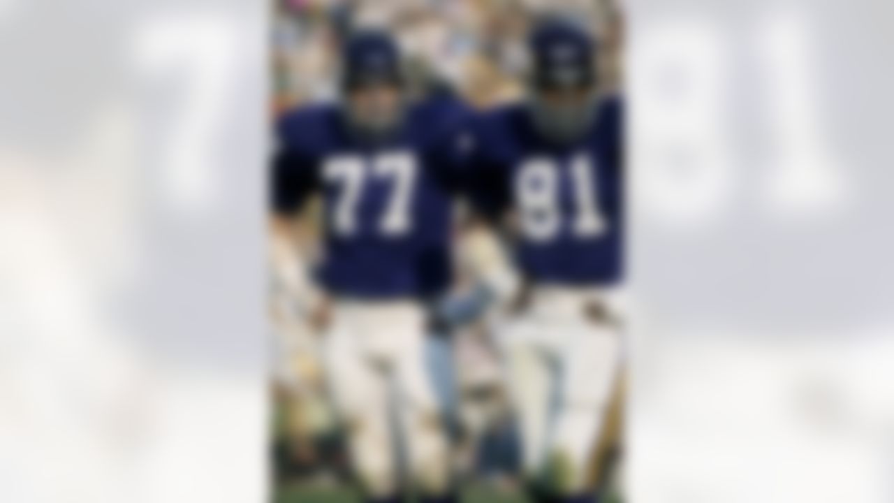 Minnesota Vikings defensive tackle Gary Larsen (77) and Hall of Fame defensive end Carl Eller (81) during the Vikings 20-13 victory over the Los Angeles Rams on December 7, 1969 at the Los Angeles Memorial Coliseum in Los Angeles, California. (National Football League)
