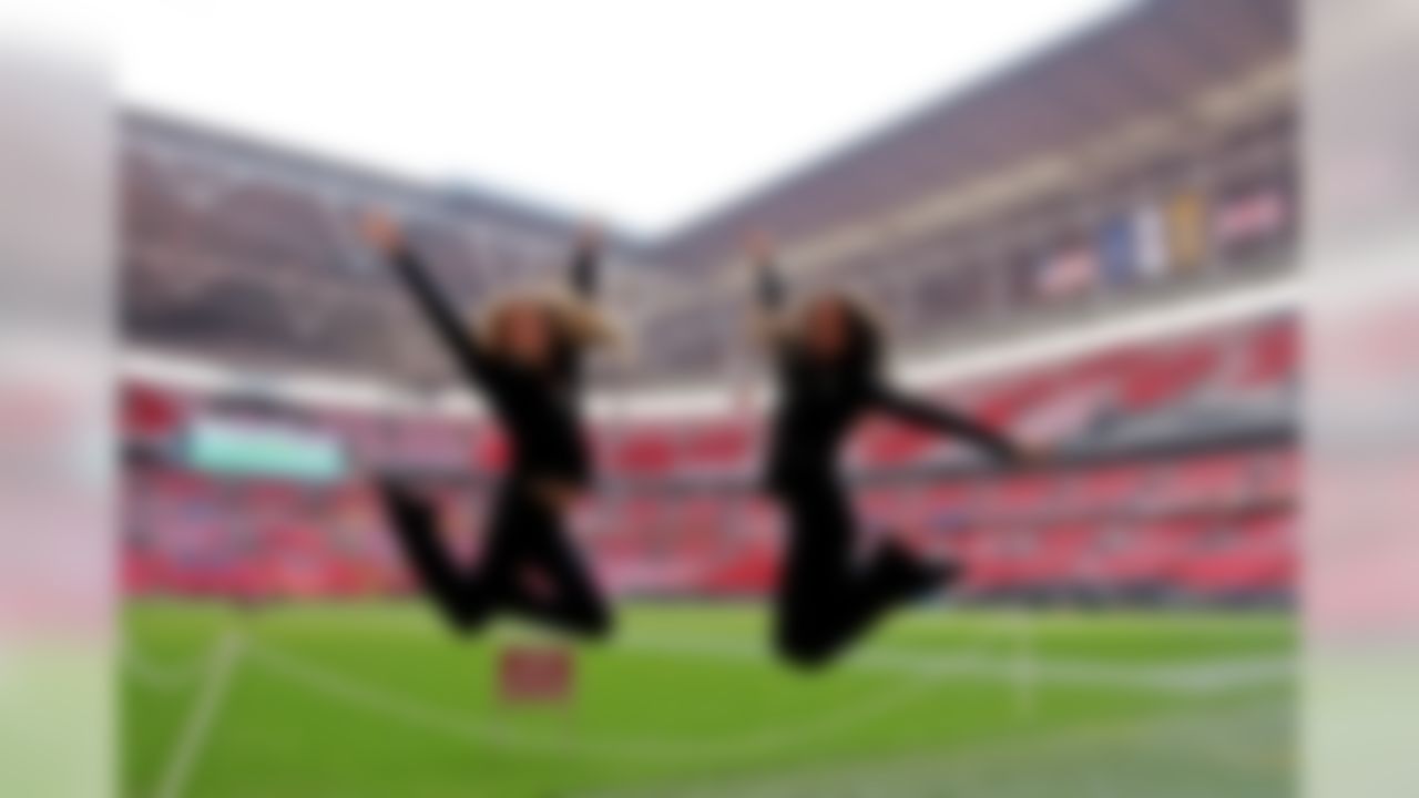 Jacksonville Jaguars cheerleaders obeying the Wembley 'Keep off the grass" ruling before the game between the Jacksonville Jaguars and Dallas Cowboys at Wembley Stadium on Sunday, Nov. 9, 2014 in London. (Nicky Hayes/NFL)