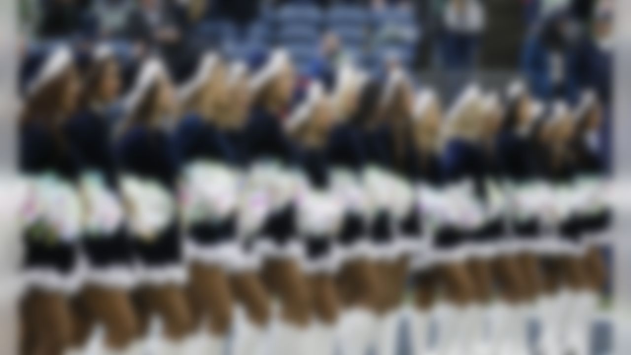 Seattle Seahawks Sea Gals cheerleaders perform before an NFL football game against the Los Angeles Rams, Sunday, Dec. 17, 2017, in Seattle.