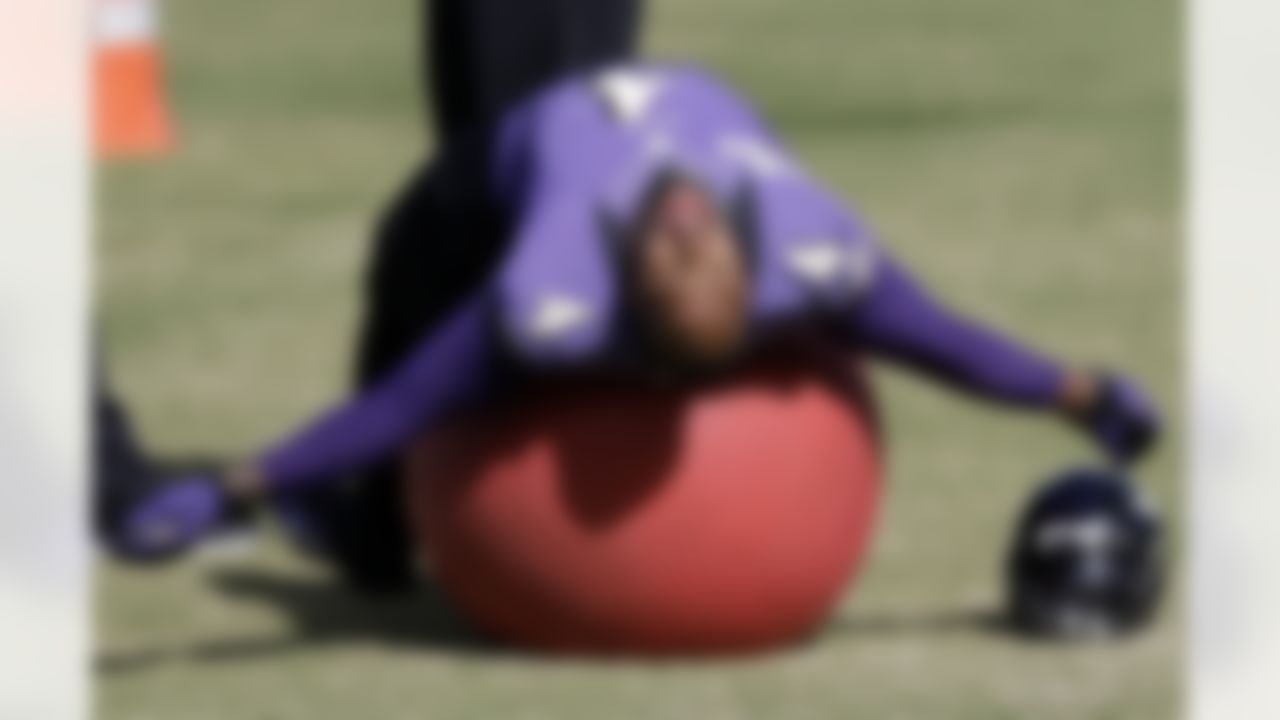Baltimore Ravens linebacker Terrell Suggs stretches on a ball during an NFL Super Bowl XLVII practice on Friday, Feb. 1, 2013, in Metairie, La. The Ravens face the San Francisco 49ers in Super Bowl XLVII on Sunday, Feb. 3. (AP Photo/Patrick Semansky)
