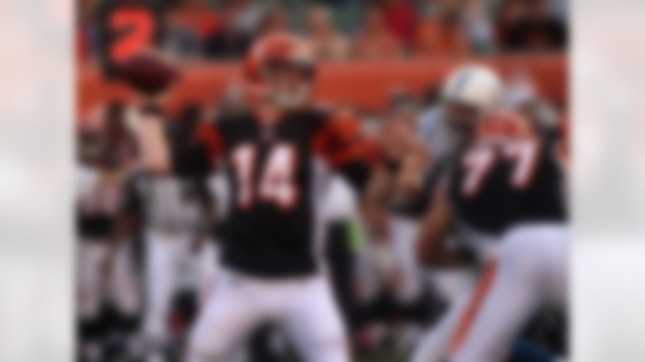Cincinnati Bengals quarterback Andy Dalton (14) in action against the Indianapolis Colts in the first half of an NFL football game, Thursday, Sept. 1, 2011 in Cincinnati. (AP Photo/Tony Tribble)