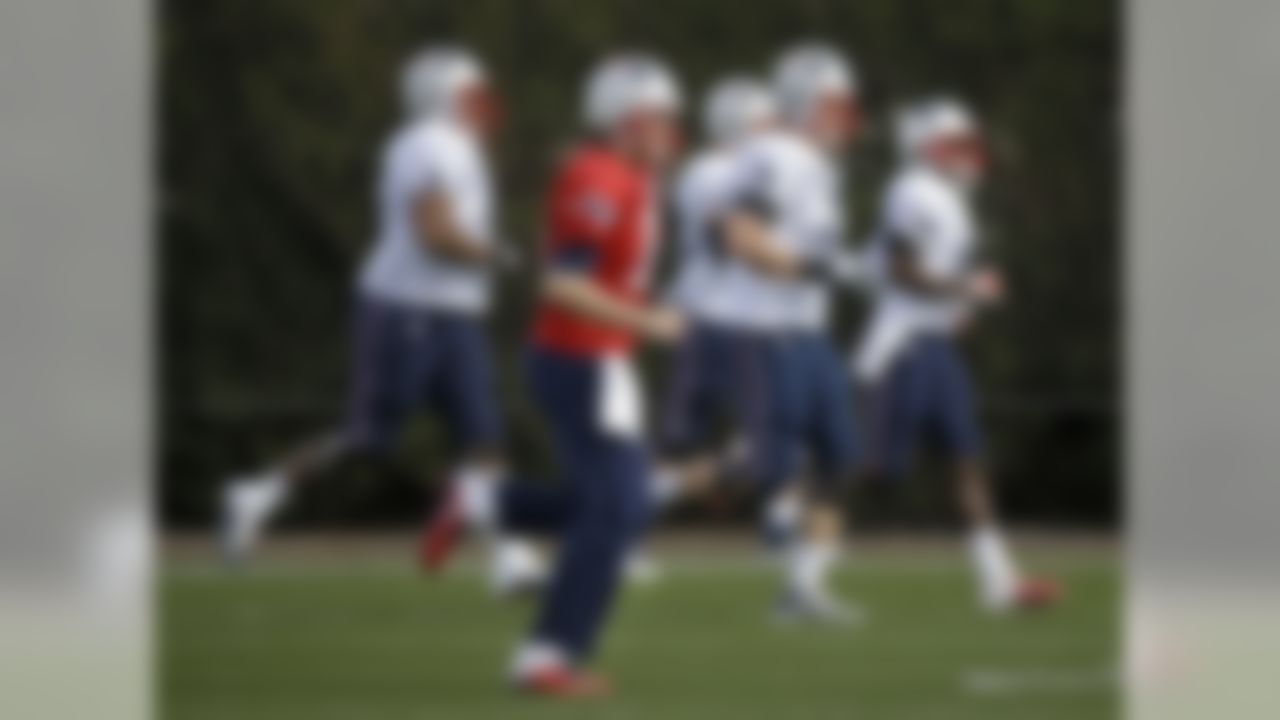 New England Patriots quarterback Tom Brady (12) warms up during practice Wednesday, Jan. 28, 2015, in Tempe, Ariz. The Patriots play the Seattle Seahawks in NFL football Super Bowl XLIX Sunday, Feb. 1, in Glendale, Ariz. (AP Photo/Mark Humphrey)