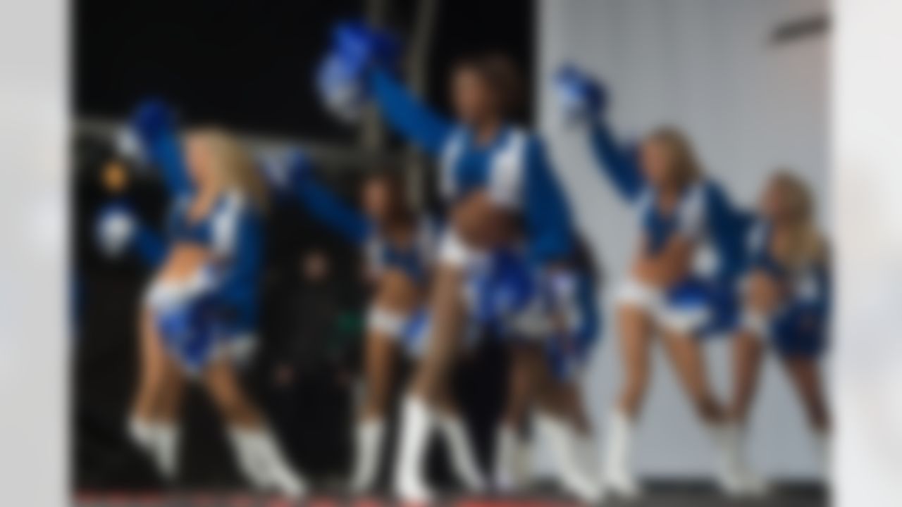 The Dallas Cowboys cheerleaders perform during the NFL Fan Rally outside Wembley Stadium, London, Saturday, Nov. 8, 2014. The Dallas Cowboys will play the Jacksonville Jaguars in an NFL football game at London's Wembley Stadium on Sunday Nov. 9. (AP Photo/Tim Ireland)