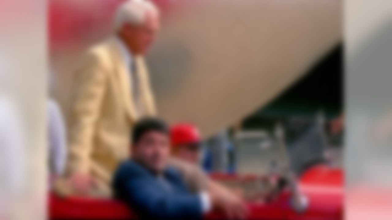 San Francisco 49ers vs. Atlanta Falcons at Candlestick Park Sunday, September 19,1993. 49ers beat Falcons 37-30. Halftime ceremonies celebrate former head coach Bill Walsh induction to the Football Hall of Fame. Eddie Debartolo siting in car with Walsh. (AP Photo/Al Golub)