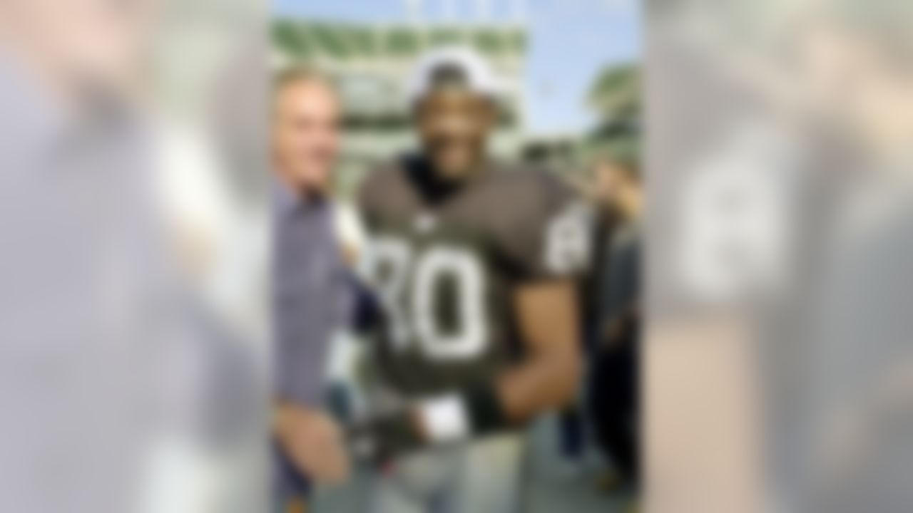 Oakland Raiders wide receiver Jerry Rice smiles after the Raiders defeated the Tennessee Titans, 52-25, Sunday, Sept. 29, 2002, in Oakland, Calif. Rice had seven catches for 144 yards and a touchdown in the game, and became the NFL's career leader in yards from scrimmage, passing Walter Payton. (AP Photo/Paul Sakuma)