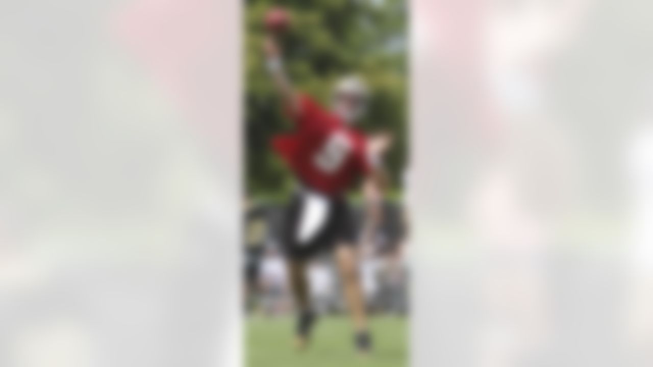 New Orleans Saints quarterback Drew Brees (9) throws a pass during the morning minicamp practice session at the club's NFL football training facility in Metairie, Saturday, June 5, 2010. (AP Photo/Bill Haber)